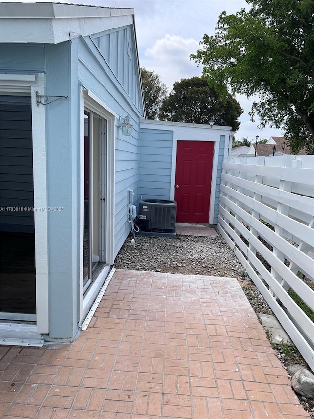 13776 SW 149 Circle Ln Unit 4-79, Miami, FL 33186 - view of patio with central air condition unit and fence