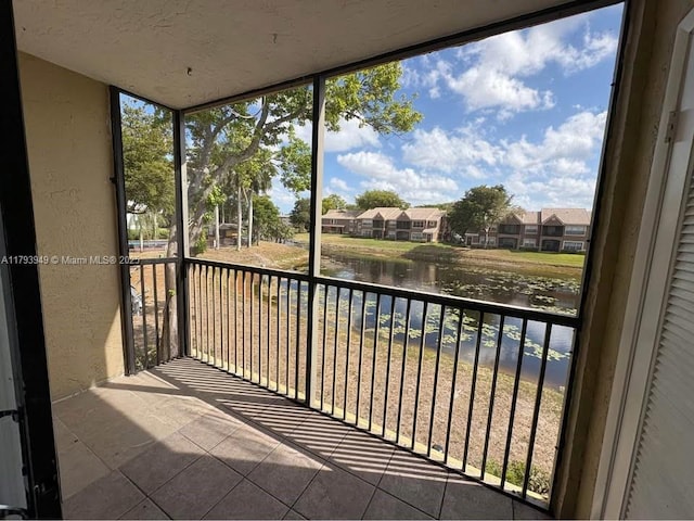 9044 NW 28th Dr Unit 3-202, Coral Springs, FL 33065 - balcony featuring a water view and a residential view