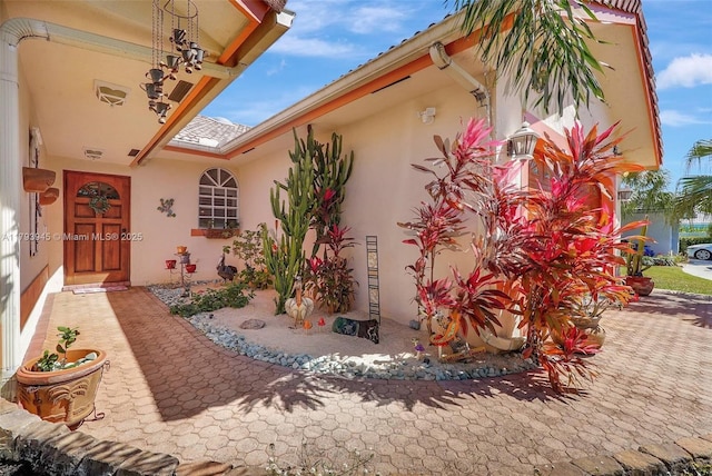 exterior space with stucco siding