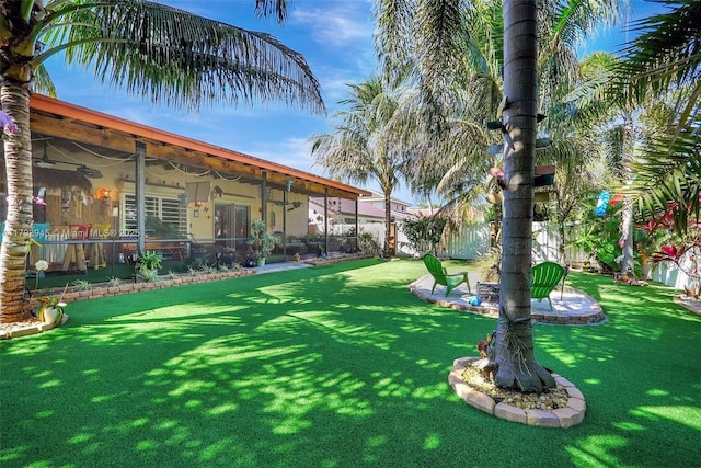 view of yard with fence
