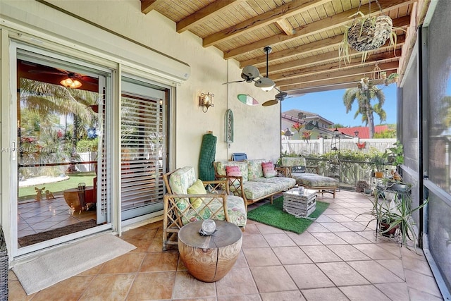 view of patio / terrace featuring a ceiling fan, outdoor lounge area, and fence