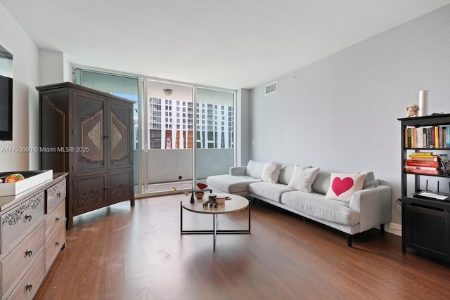 500 NE 29th St Unit 606, Miami, FL 33137 - living room with visible vents and wood finished floors