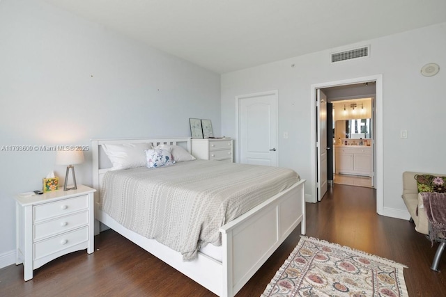 500 NE 29th St Unit 606, Miami, FL 33137 - bedroom featuring baseboards, visible vents, and dark wood-type flooring