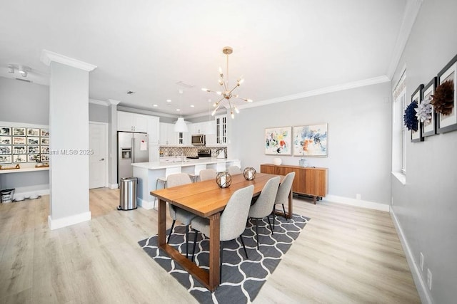 721 Tanglewood Cir, Weston, FL 33327 - dining area with crown molding, baseboards, and light wood-type flooring