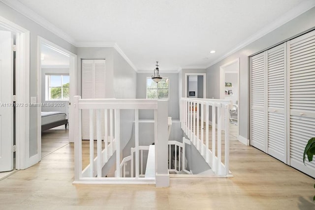 721 Tanglewood Cir, Weston, FL 33327 - hall featuring a wealth of natural light, wood finished floors, and an upstairs landing