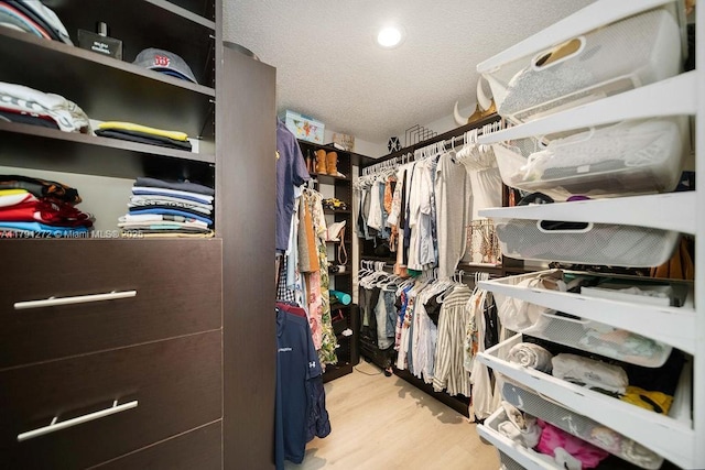 721 Tanglewood Cir, Weston, FL 33327 - walk in closet featuring light wood finished floors