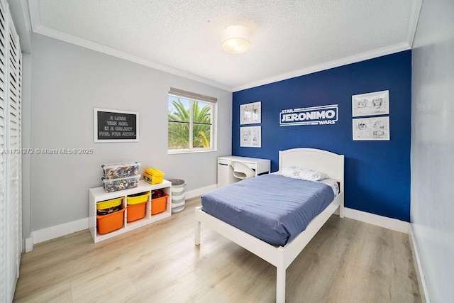 721 Tanglewood Cir, Weston, FL 33327 - bedroom featuring a textured ceiling, ornamental molding, and wood finished floors