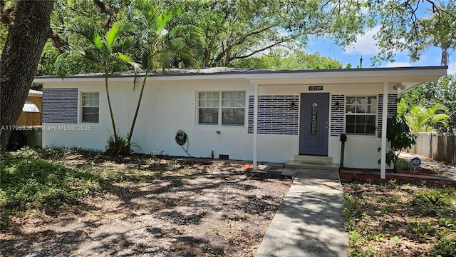12120 NE 11th Pl, North Miami, FL 33161 - view of front facade featuring stucco siding