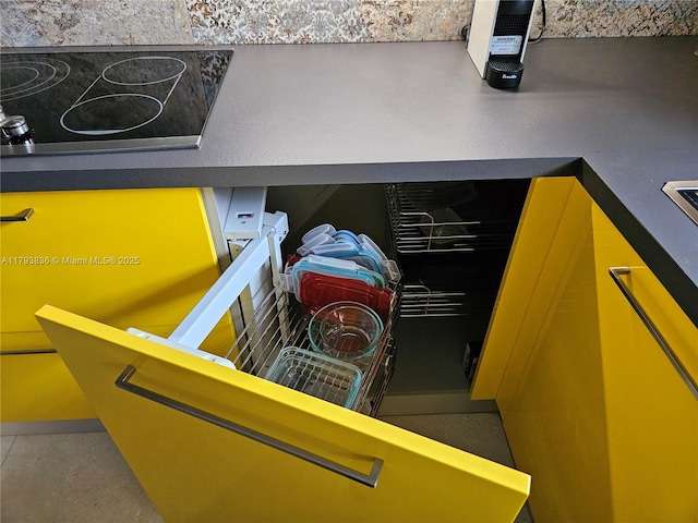 interior details featuring black electric cooktop