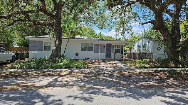 12120 NE 11th Pl, North Miami, FL 33161 - single story home with stucco siding and fence
