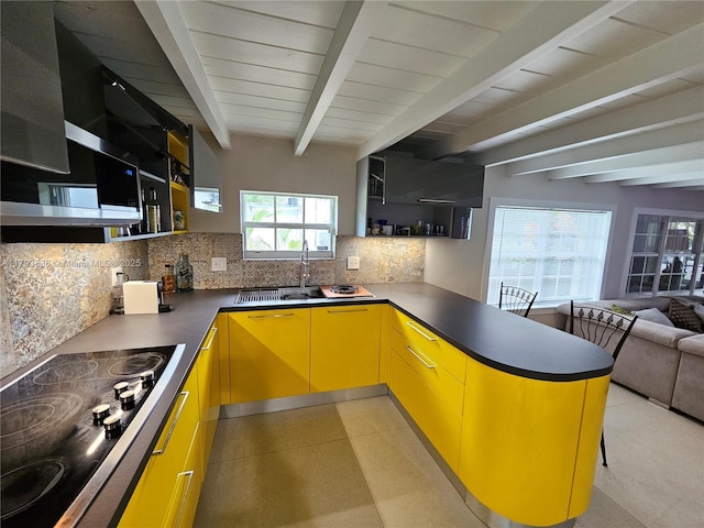 kitchen with decorative backsplash, a peninsula, open shelves, and black electric stovetop