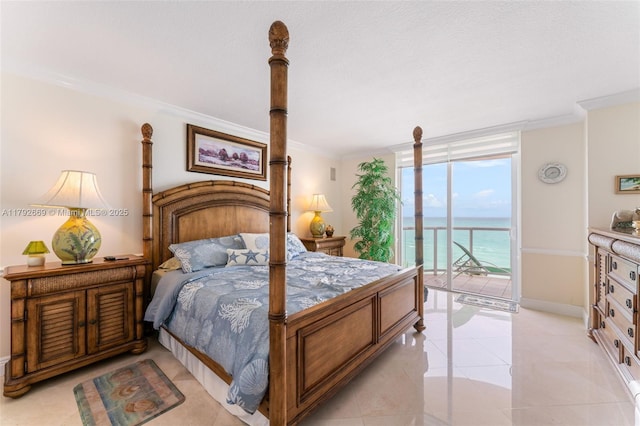 bedroom featuring access to exterior, baseboards, a water view, floor to ceiling windows, and ornamental molding