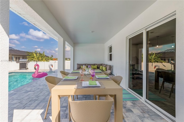 view of patio / terrace with a fenced backyard and a fenced in pool