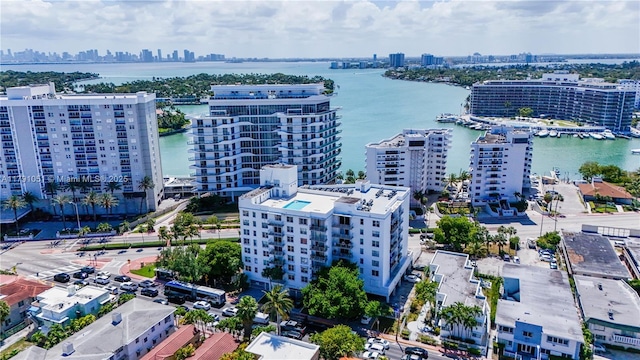 bird's eye view with a view of city and a water view