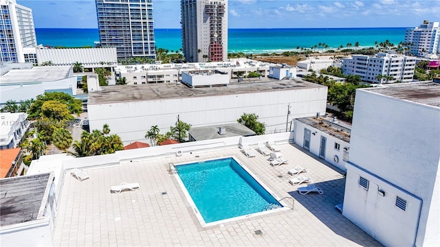 drone / aerial view with a water view and a city view