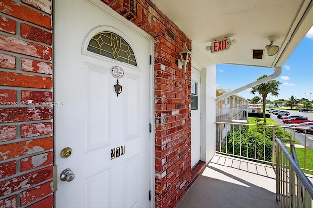 401 S Golf Blvd Unit 270, Pompano Beach, FL 33064 - property entrance featuring brick siding and covered porch