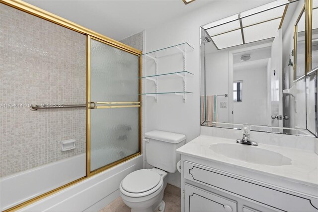401 S Golf Blvd Unit 270, Pompano Beach, FL 33064 - full bath with vanity, bath / shower combo with glass door, and tile patterned flooring