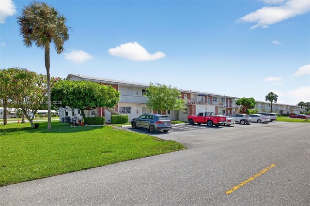 401 S Golf Blvd Unit 270, Pompano Beach, FL 33064 - view of property with uncovered parking and a residential view
