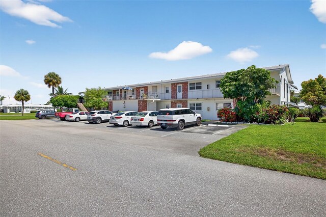 401 S Golf Blvd Unit 270, Pompano Beach, FL 33064 - view of building exterior featuring uncovered parking