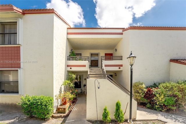 1100 N Hiatus Rd Unit 1100, Pembroke Pines, FL 33026 - doorway to property featuring stucco siding