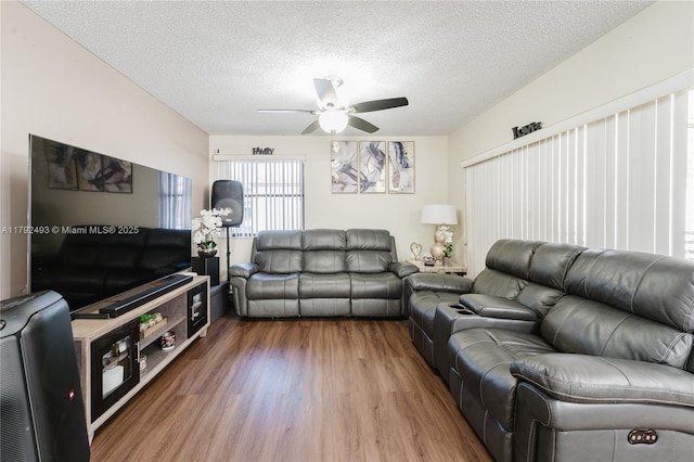 1100 N Hiatus Rd Unit 1100, Pembroke Pines, FL 33026 - living room with a textured ceiling, a ceiling fan, and wood finished floors