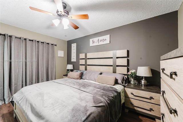 1100 N Hiatus Rd Unit 1100, Pembroke Pines, FL 33026 - bedroom featuring a textured ceiling, dark wood finished floors, and a ceiling fan