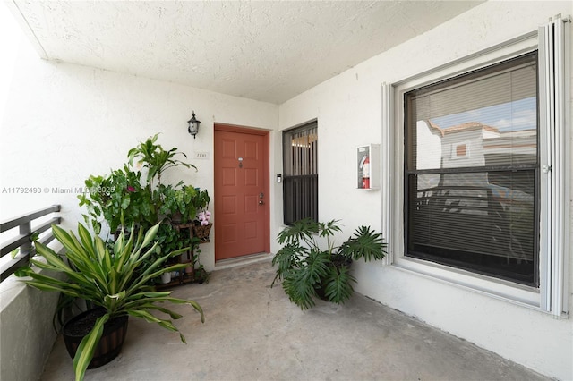 1100 N Hiatus Rd Unit 1100, Pembroke Pines, FL 33026 - doorway to property featuring stucco siding