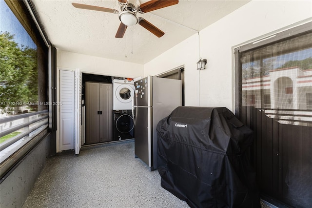 1100 N Hiatus Rd Unit 1100, Pembroke Pines, FL 33026 - exterior space with stacked washer and dryer, a ceiling fan, and laundry area