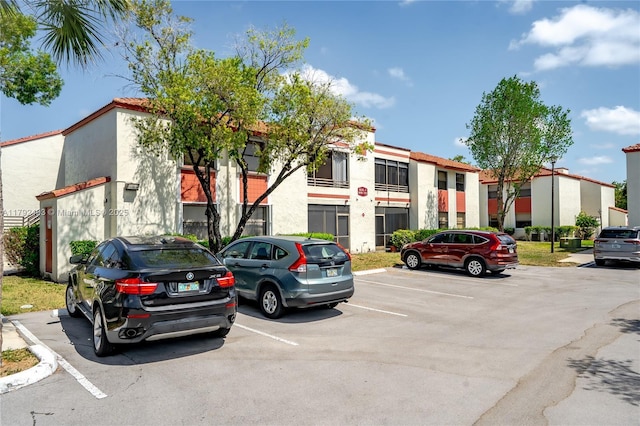 1100 N Hiatus Rd Unit 1100, Pembroke Pines, FL 33026 - view of property with uncovered parking