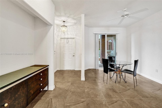 7715 Southampton Ter Unit 110, Tamarac, FL 33321 - dining room featuring baseboards, ceiling fan, and tile patterned flooring