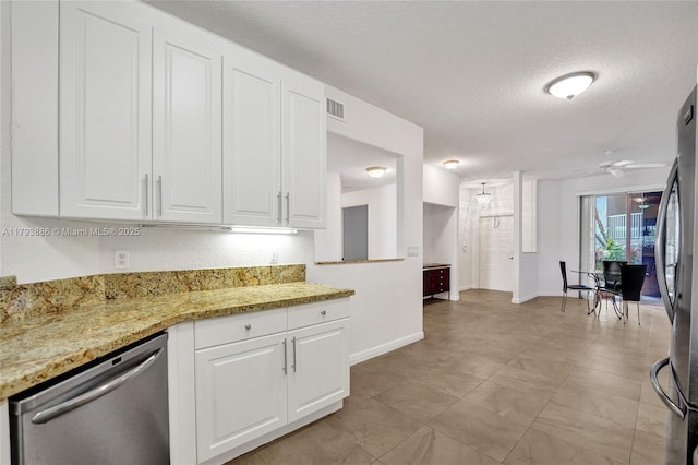 7715 Southampton Ter Unit 110, Tamarac, FL 33321 - kitchen with visible vents, a ceiling fan, white cabinetry, and stainless steel appliances