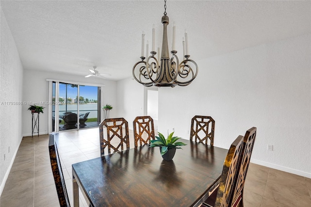 7715 Southampton Ter Unit 110, Tamarac, FL 33321 - dining area featuring baseboards, light tile patterned floors, and ceiling fan with notable chandelier
