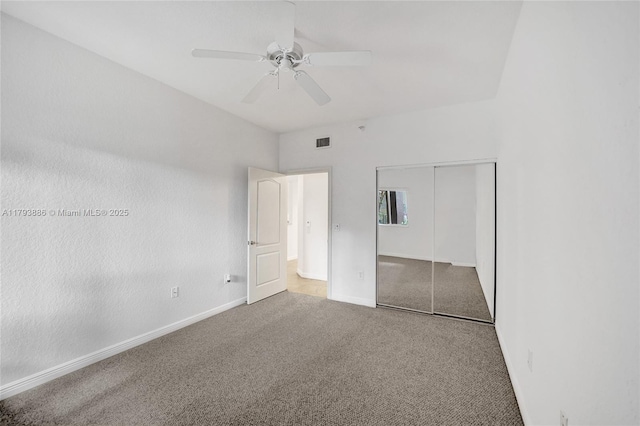 7715 Southampton Ter Unit 110, Tamarac, FL 33321 - unfurnished bedroom featuring visible vents, a ceiling fan, a closet, baseboards, and carpet flooring