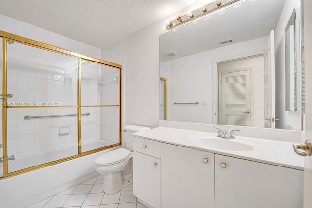7715 Southampton Ter Unit 110, Tamarac, FL 33321 - bathroom with visible vents, tile patterned flooring, vanity, toilet, and bath / shower combo with glass door