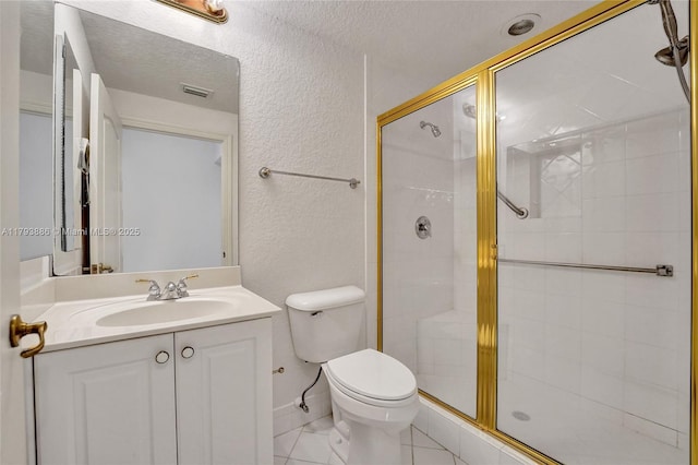 7715 Southampton Ter Unit 110, Tamarac, FL 33321 - bathroom featuring visible vents, a shower stall, vanity, toilet, and a textured wall