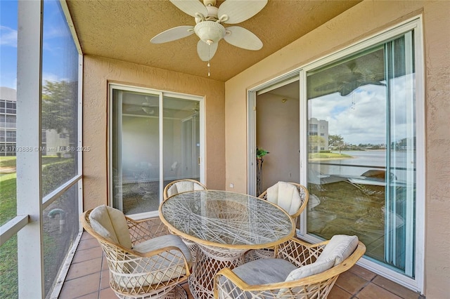 7715 Southampton Ter Unit 110, Tamarac, FL 33321 - sunroom with a water view, a ceiling fan, and outdoor dining space