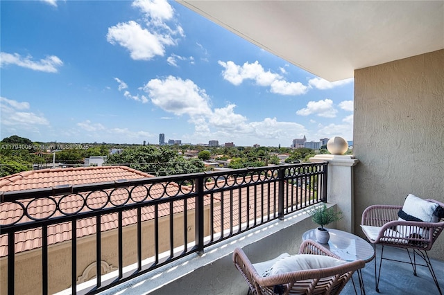 balcony featuring a city view