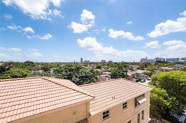 birds eye view of property with a view of city