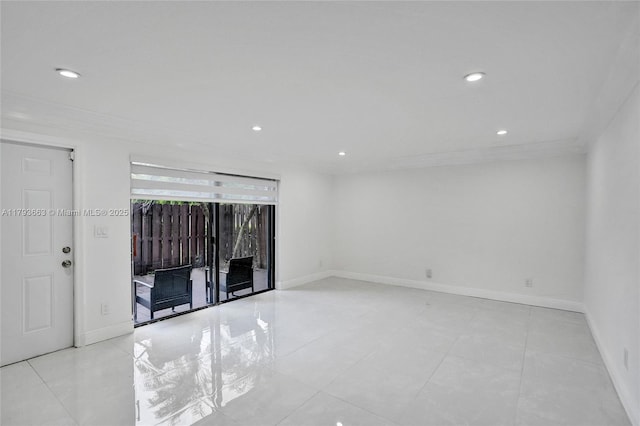 unfurnished room with recessed lighting, crown molding, baseboards, and light tile patterned floors