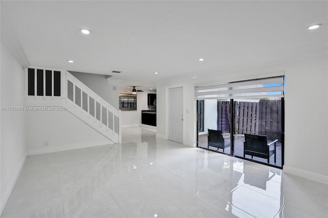 spare room featuring stairs, baseboards, recessed lighting, and ceiling fan