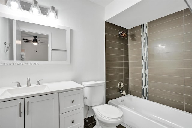 bathroom featuring ceiling fan, bathtub / shower combination, vanity, and toilet