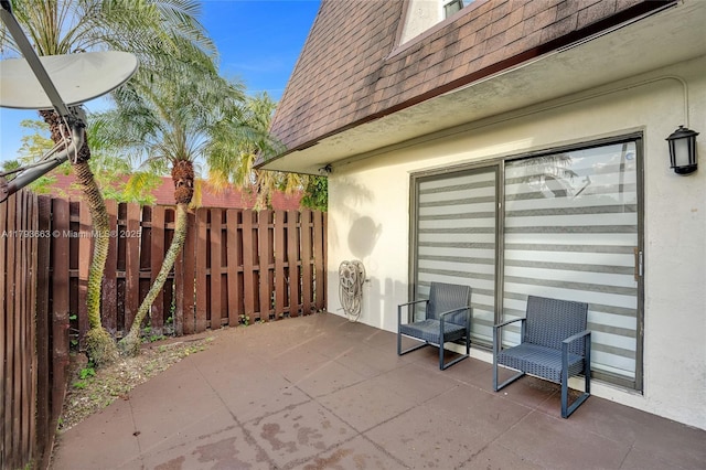 view of patio / terrace with fence