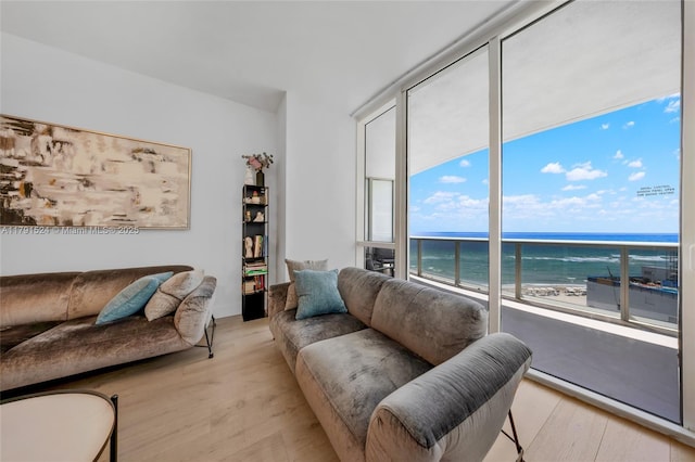 16001 Collins Ave Unit 707, Sunny Isles Beach, FL 33160 - living area featuring light wood finished floors and a water view