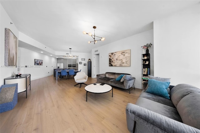 16001 Collins Ave Unit 707, Sunny Isles Beach, FL 33160 - living area with a chandelier, light wood finished floors, baseboards, and recessed lighting