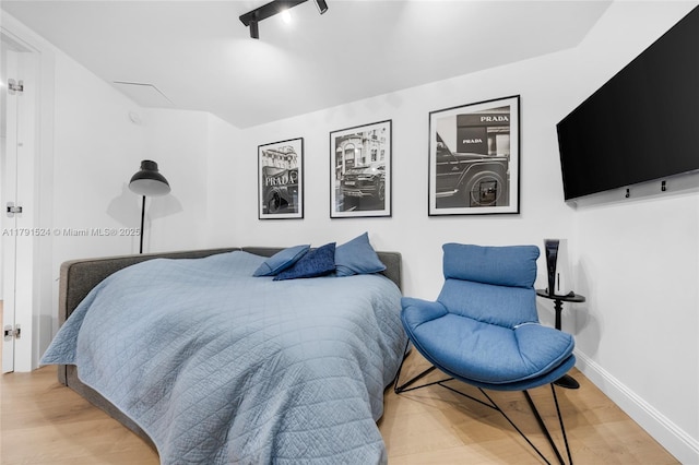 16001 Collins Ave Unit 707, Sunny Isles Beach, FL 33160 - bedroom featuring wood finished floors and baseboards