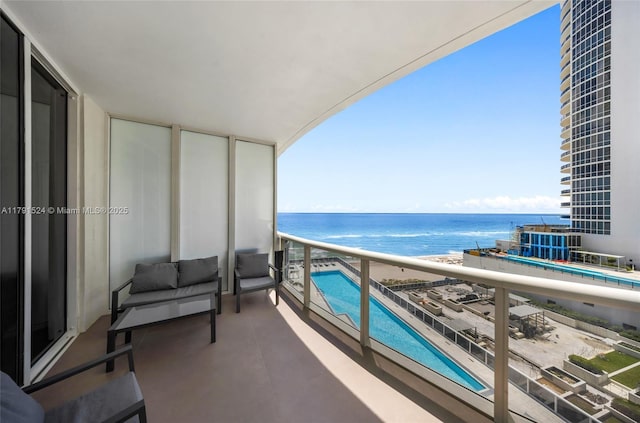 16001 Collins Ave Unit 707, Sunny Isles Beach, FL 33160 - balcony with view of pool and a water view