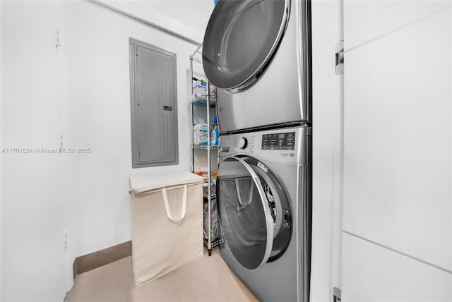 16001 Collins Ave Unit 707, Sunny Isles Beach, FL 33160 - washroom with stacked washer / drying machine and electric panel
