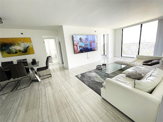 living room with a wall of windows