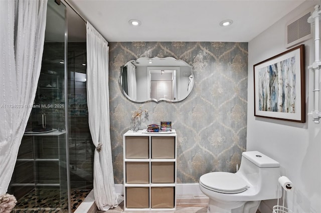 full bathroom featuring vanity, toilet, recessed lighting, visible vents, and a stall shower