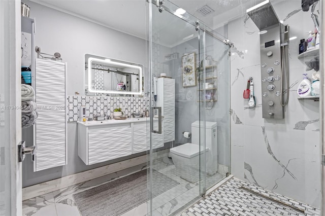 bathroom with vanity, marble finish floor, toilet, a shower stall, and backsplash